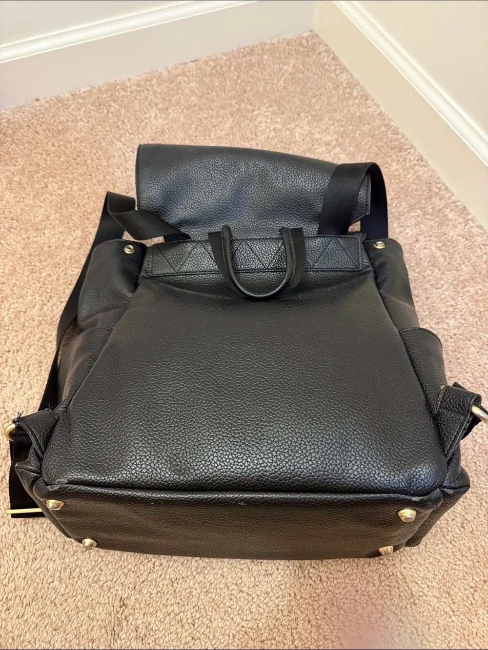 Freshly picked black leather diaper bag